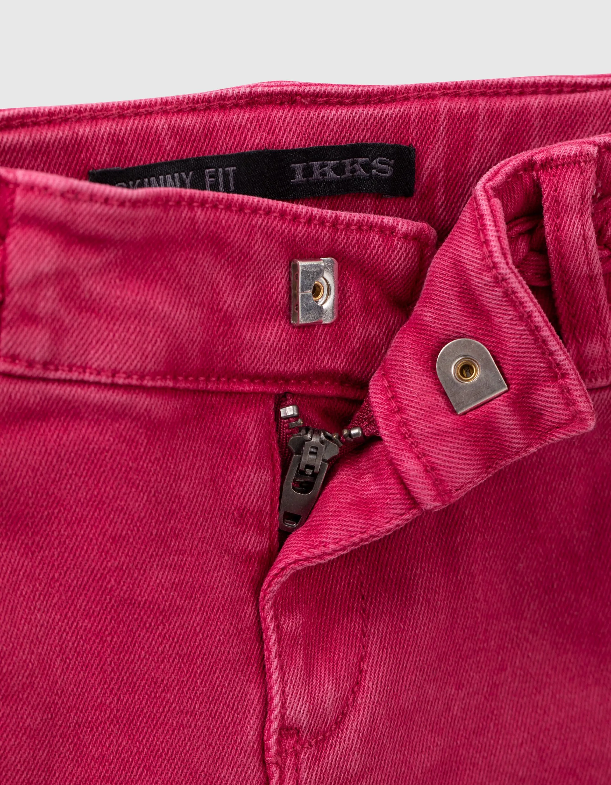 Jean skinny fuchsia ceinture tressée fille